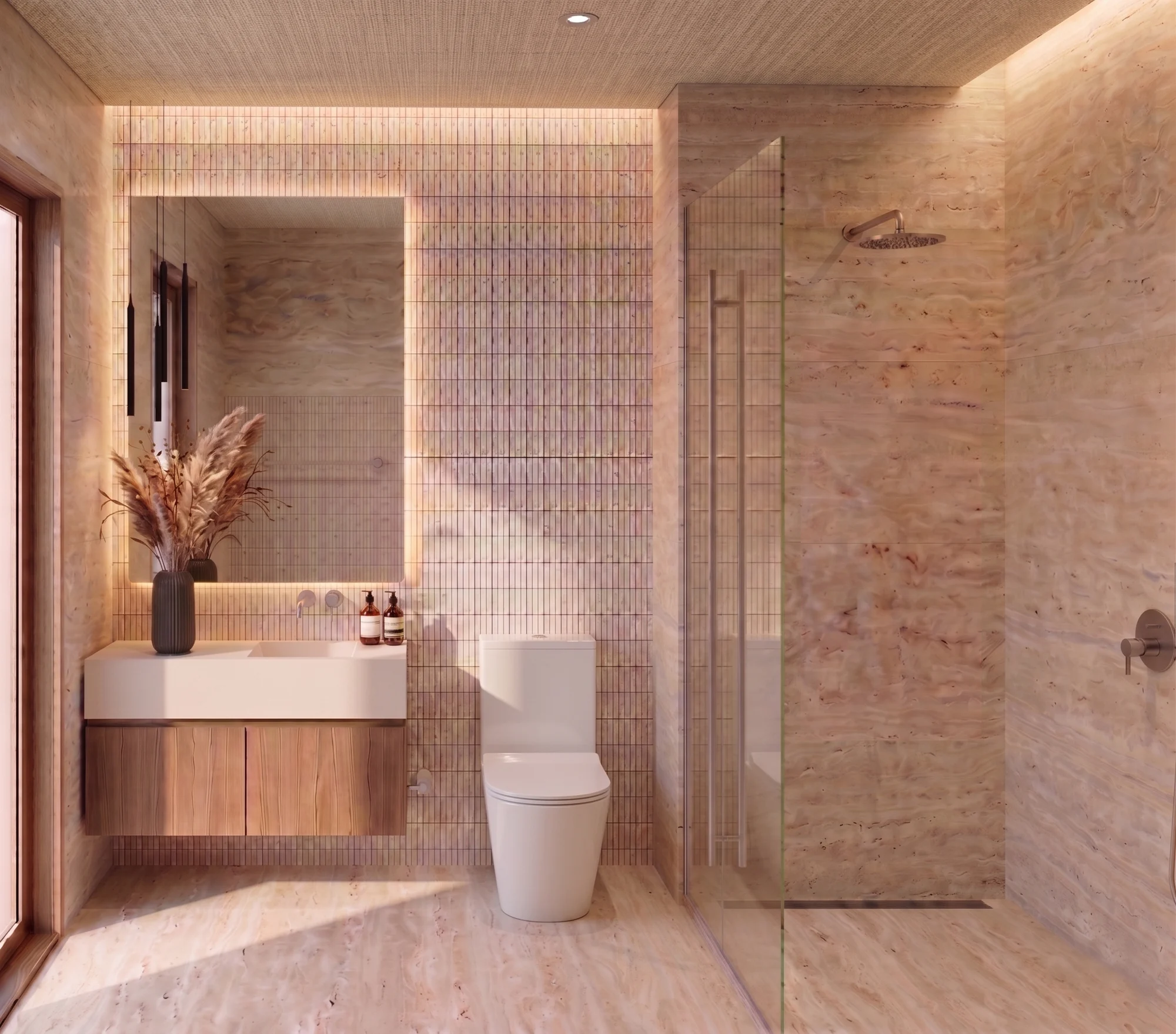 Baño de un departamento Baalá con acabado tipo hotel, doble tono cálido, vanidad flotante y regadera amplia.